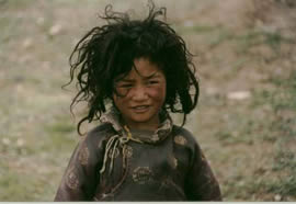 A boy in Kham. Click to see more Tibet photos ...